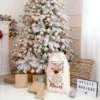 Saco de Navidad personalizado con diseño vintage de Papá Noel, hecho en algodón ecológico, ideal para guardar los regalos bajo el árbol.
