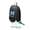 Mochila comunión nombre e inicial colores azul