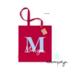 Bolsa con nombre e inicial para eventos roja